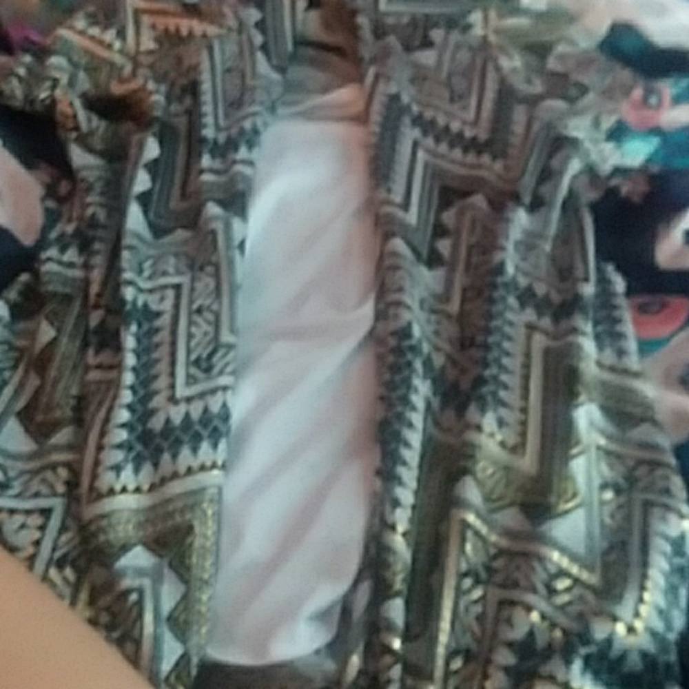 Grey and gold printed attached to white shirt